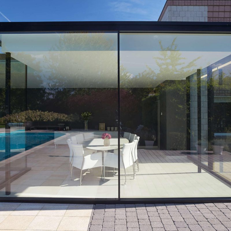 Modern summer cafe exterior with big glass doors